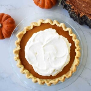 Perfect Pumpkin Pie by Modern Honey. Pumpkin Pie with sweetened condensed milk. Pumpkin Pie filling made with sweetened condensed milk, eggs, and spices. Creamy Pumpkin Pie every time!