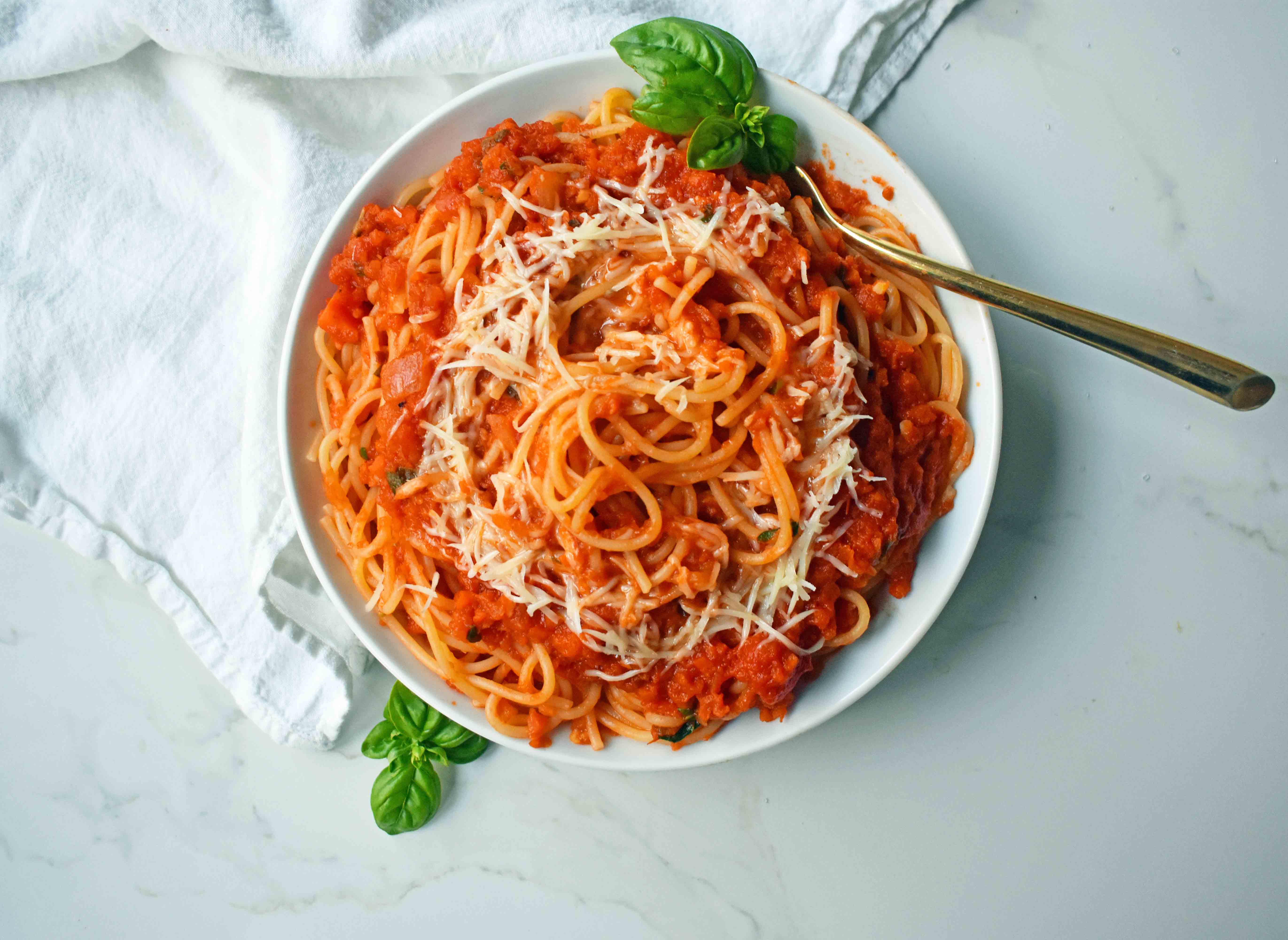 Thick and flavorful homemade spaghetti sauce is packed with Italian flavors in a smooth tomato base. The only marinara sauce you’ll ever need!