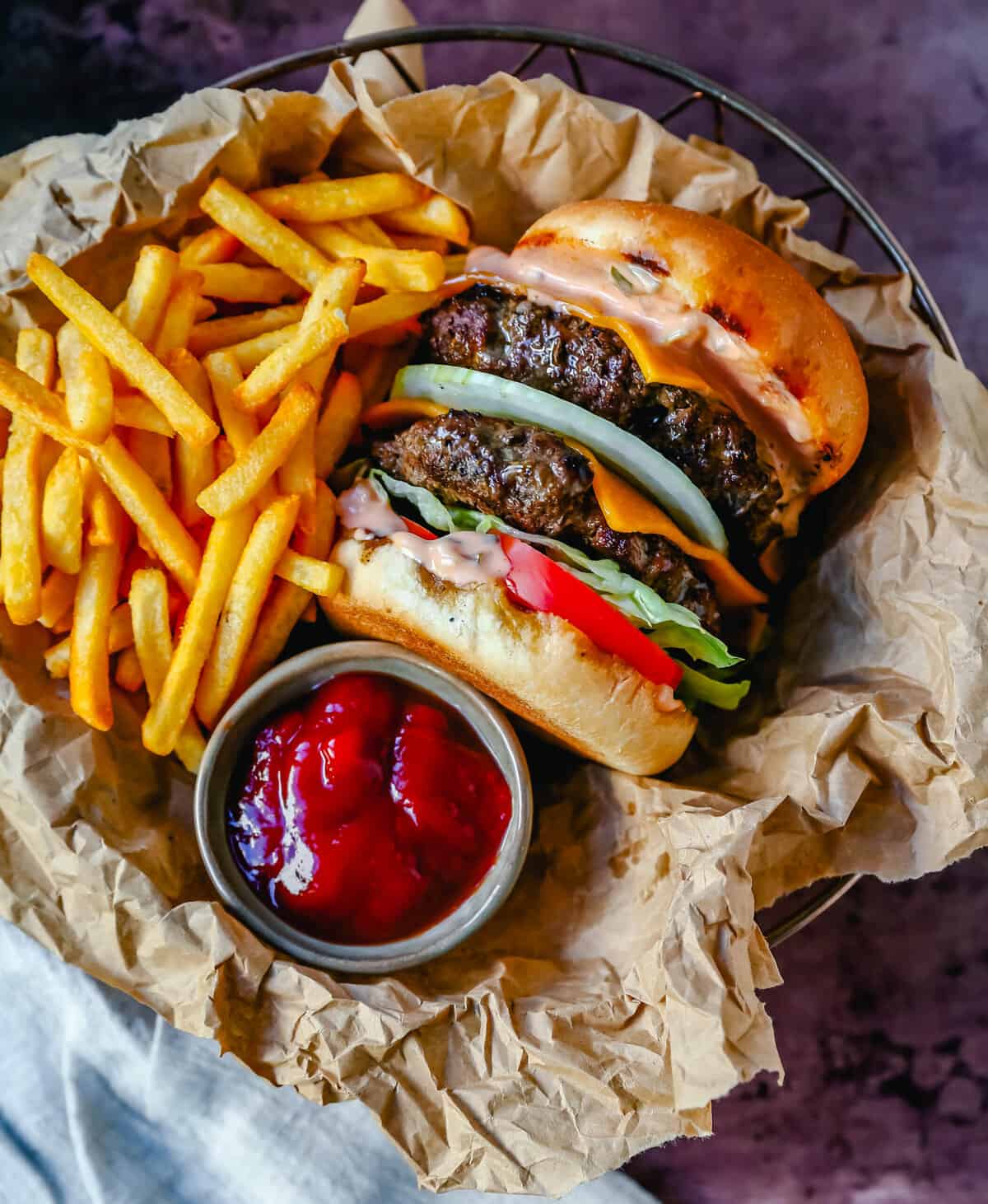 https://www.modernhoney.com/wp-content/uploads/2022/05/Double-Double-Cheeseburger-with-Fries-Recipe-scaled.jpg