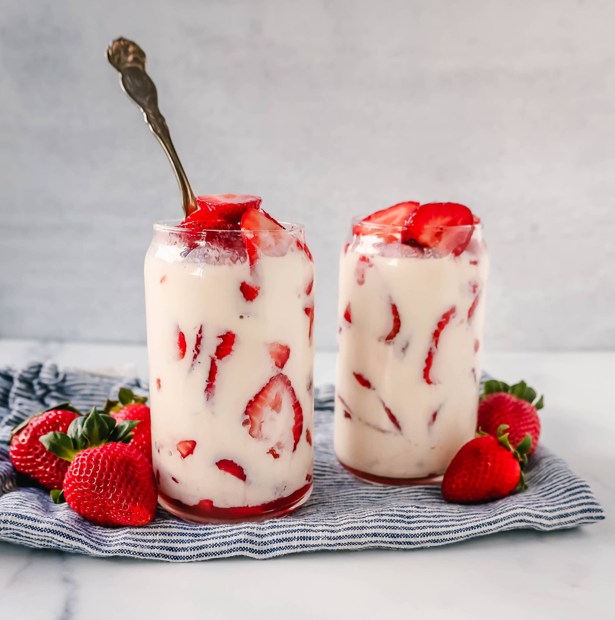 This Fresas con Crema is an authentic Mexican dessert made with fresh sliced Strawberries, Mexican Crema, Heavy Cream, and Sweetened Condensed Milk. This is the best Strawberries and Cream recipe!