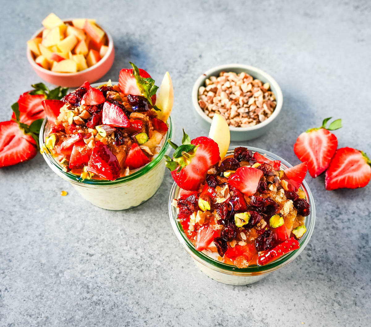 This overnight oats recipe also called Bircher Muesli is made by soaking oats overnight with juice, milk, honey, vanilla, and greek yogurt and then fold in vanilla whipped cream for extra creaminess and topped with fresh fruits, dried fruits, and nuts. It is the perfect and delicious easy, grab-and-go breakfast.