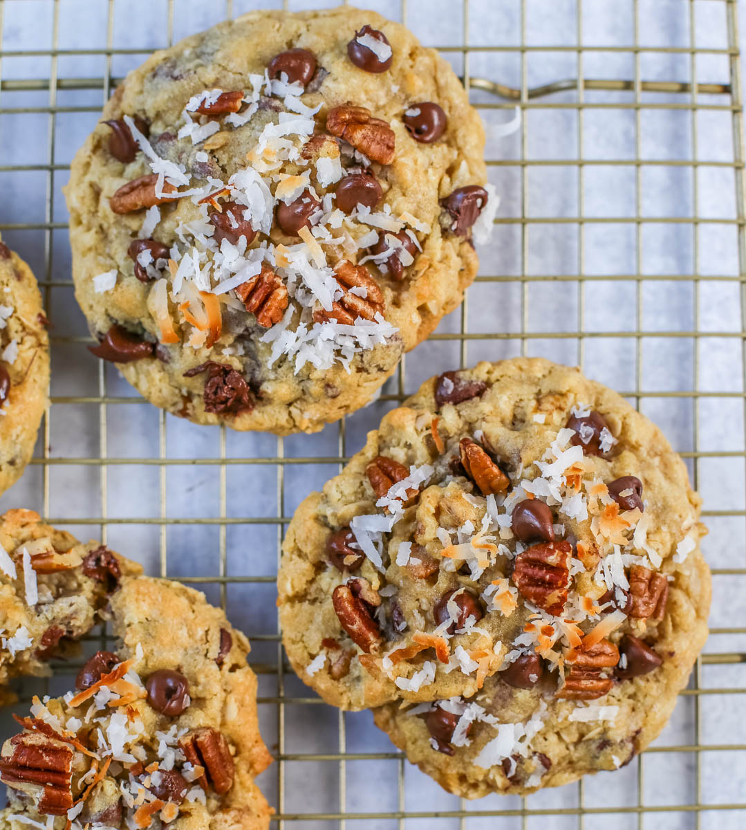 These soft, chewy, chunky Cowboy Cookies are made with oats, chocolate chips, shredded coconut, and pecans making them perfectly sweet, salty, nutty, and hearty. This is the best Cowboy Cookies recipe!