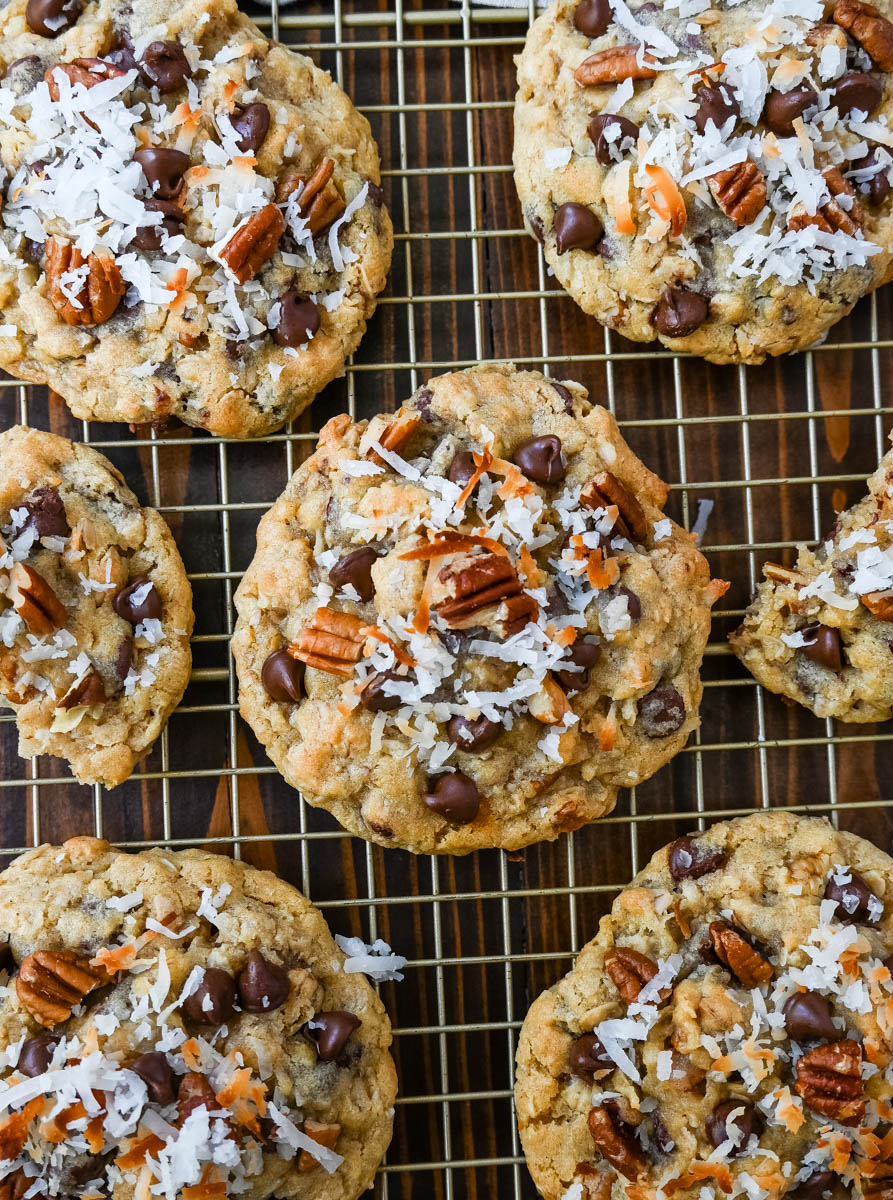 These soft, chewy, chunky Cowboy Cookies are made with oats, chocolate chips, shredded coconut, and pecans making them perfectly sweet, salty, nutty, and hearty. This is the best Cowboy Cookies recipe!