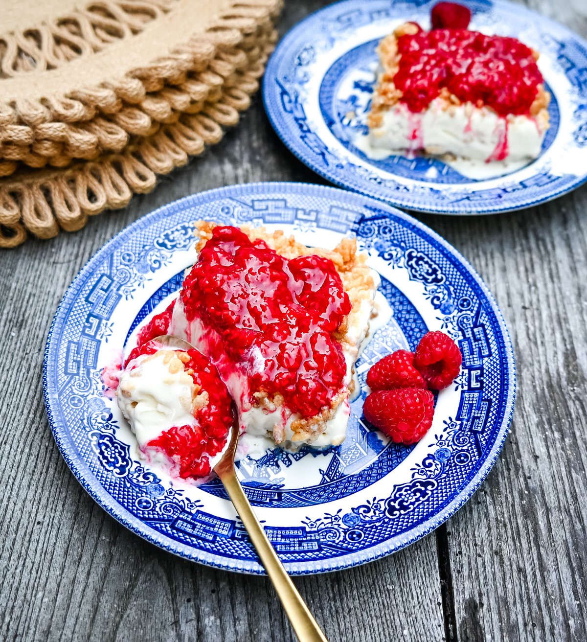 Crunchy Munchy Ice Cream Dessert. This popular ice cream dessert has a crunchy topping made with browned butter, sugar, and Rice Krispies cereal and is layered between vanilla ice cream and topped with a homemade raspberry sauce. The best ice cream dessert recipe!