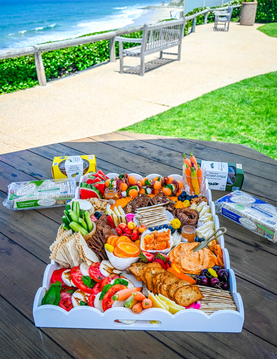 How to make an epic, beautiful Summer Charcuterie Board highlighting all of the fresh fruits and vegetables in season, paired with cheeses and meats perfect for summer. I am sharing all of the ideas on how to create the perfect charcuterie board for summer.