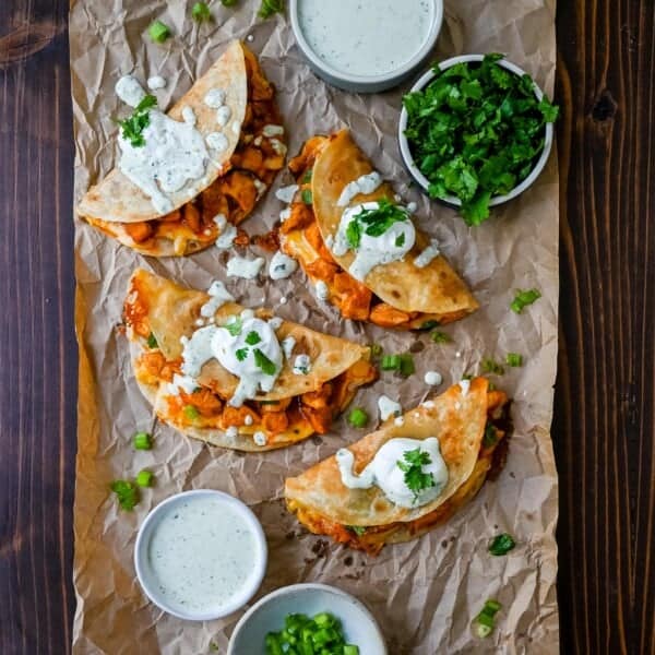 These Crispy Buffalo Chicken Tacos with Jalapeno Ranch Dressing are made with spicy buffalo chicken, melted cheese, drizzled with a homemade cilantro jalapeno ranch. Whether you’re hosting a game day party, preparing a family dinner, or looking for a fun and flavorful meal, these buffalo chicken tacos are a hit!