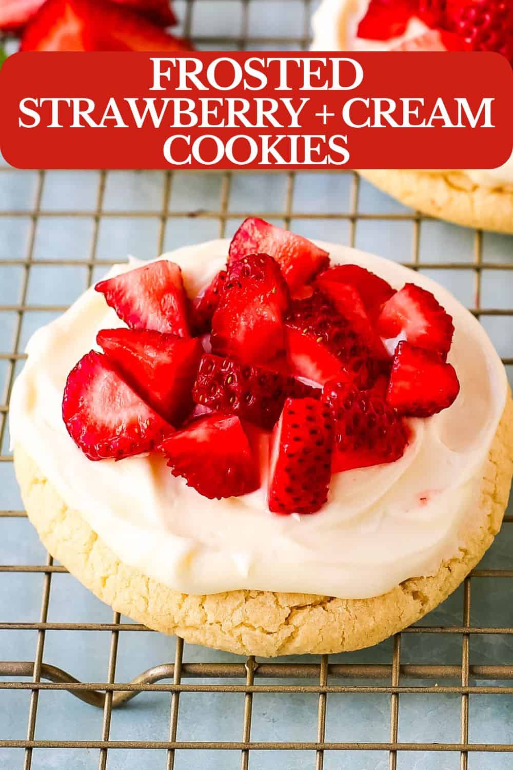 These Frosted Strawberries and Cream Cookies are soft, buttery sugar cookies topped with velvety smooth, sweet cream cheese frosting and topped with fresh strawberries. The perfect frosted strawberry cookie recipe!