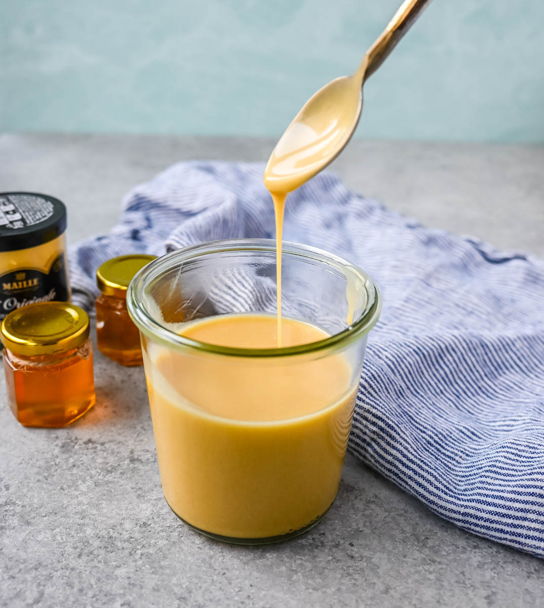 This homemade honey mustard dressing recipe is a perfect balance of sweet, tangy, and creamy and is the perfect salad dressing, dip, or marinade.