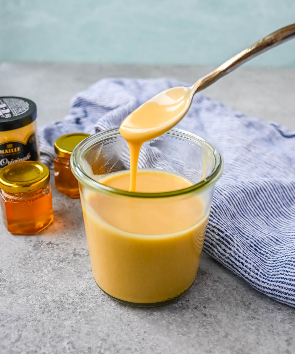 This homemade honey mustard dressing recipe is a perfect balance of sweet, tangy, and creamy and is the perfect salad dressing, dip, or marinade.