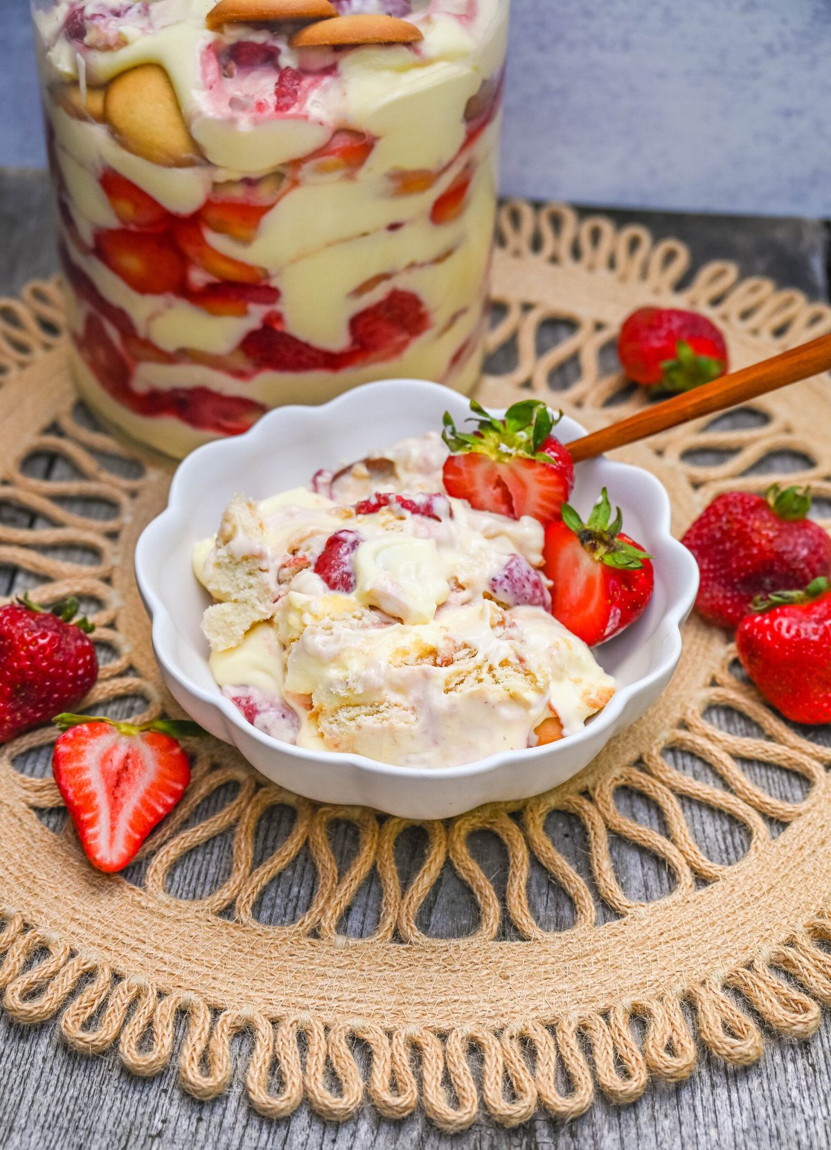 This Magnolia Bakery Strawberry Shortcake Pudding is such a quintessential summer dessert. It is made with fresh or roasted strawberries in a creamy vanilla pudding and whipped cream with Nilla wafers. This Strawberry Shortcake Pudding will be your favorite no-bake summer dessert recipe. This strawberry trifle will be a hit!