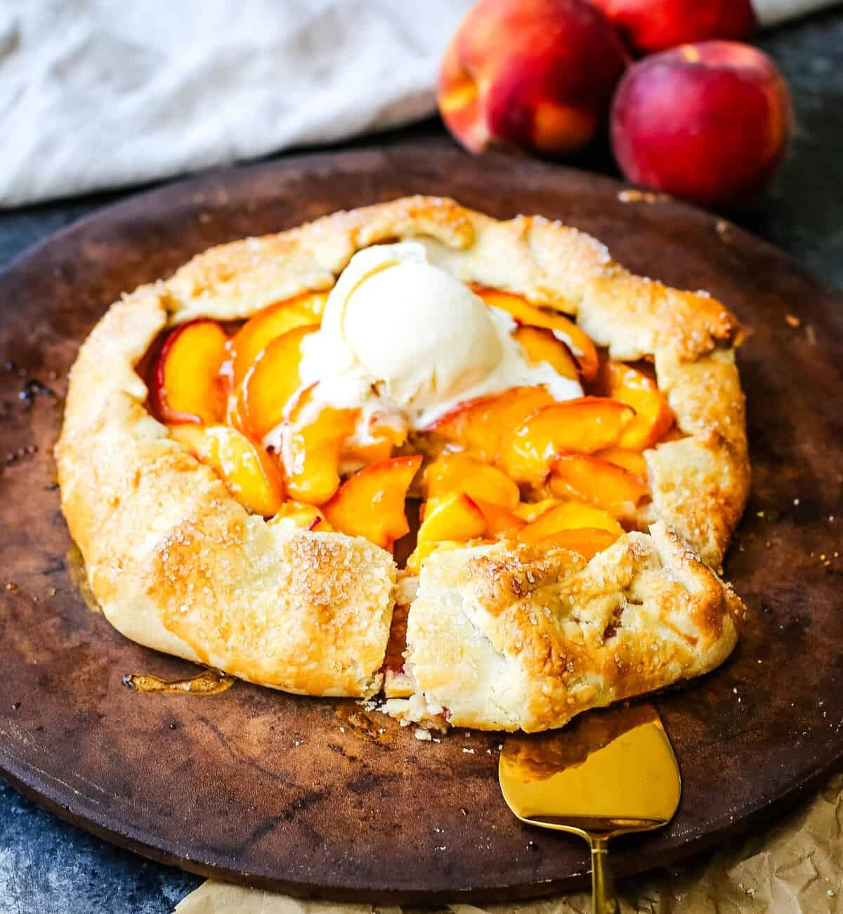 This Homemade Peach Galette is made with a warm, golden crust that's both buttery and flaky and filled with juicy, sweetened, sun-ripened peaches and baked until perfection. This is the perfect summer dessert recipe!