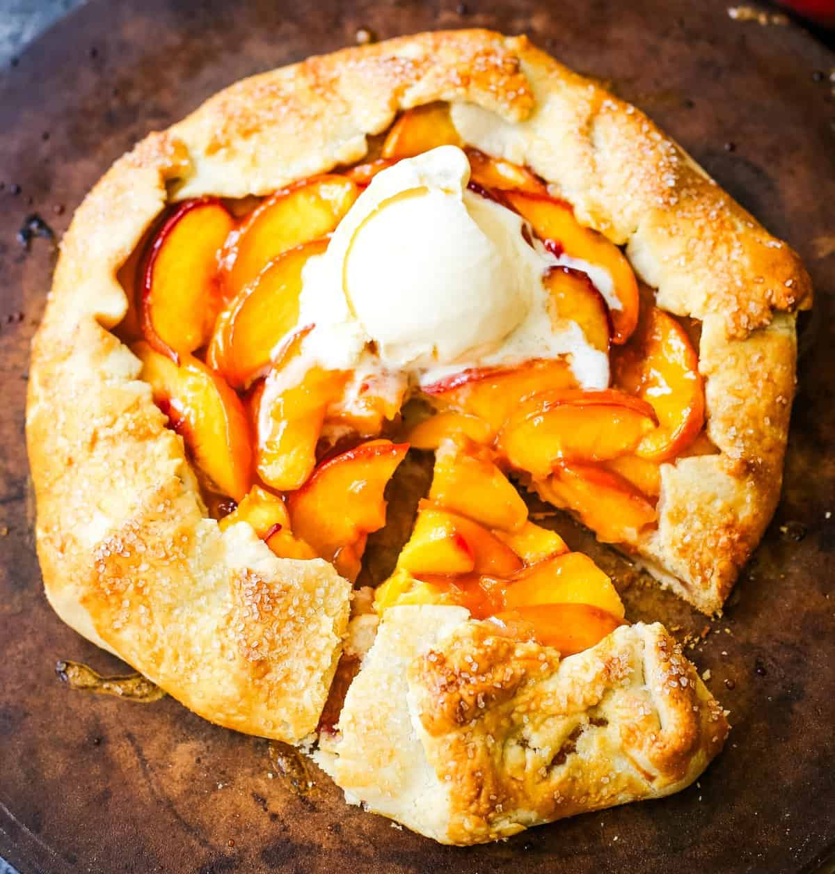 This Homemade Peach Galette is made with a warm, golden crust that's both buttery and flaky and filled with juicy, sweetened, sun-ripened peaches and baked until perfection. This is the perfect summer dessert recipe!