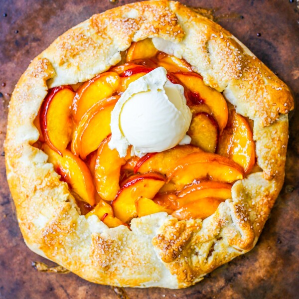 This Homemade Peach Galette is made with a warm, golden crust that's both buttery and flaky and filled with juicy, sweetened, sun-ripened peaches and baked until perfection. This is the perfect summer dessert recipe!