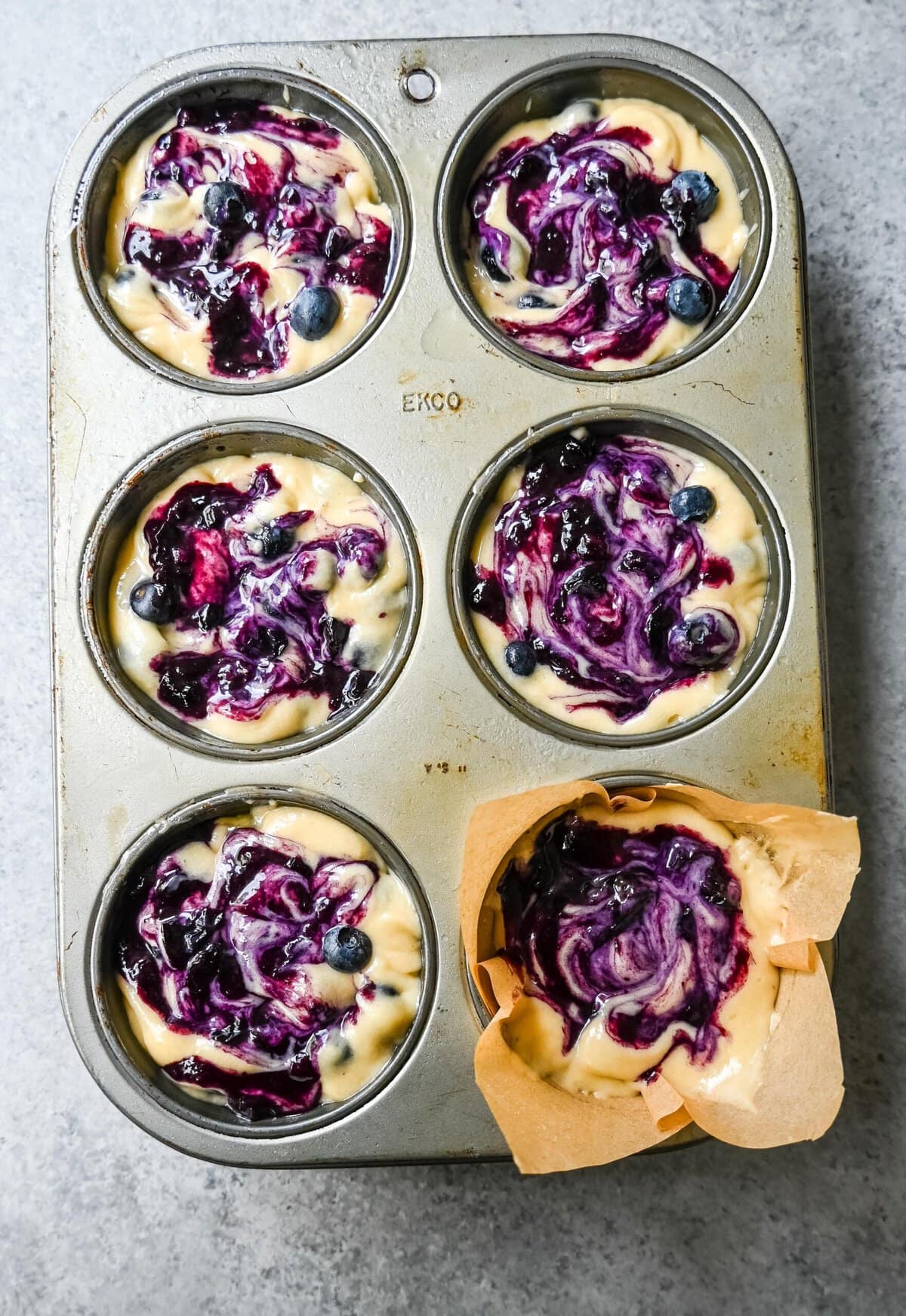 Bursting with juicy blueberries and surrounded by a tender, fluffy crumb, these muffins are a breakfast staple that everyone loves. This blueberry muffin recipe uses both butter and oil plus buttermilk to make the most tender, moistest blueberry muffins!