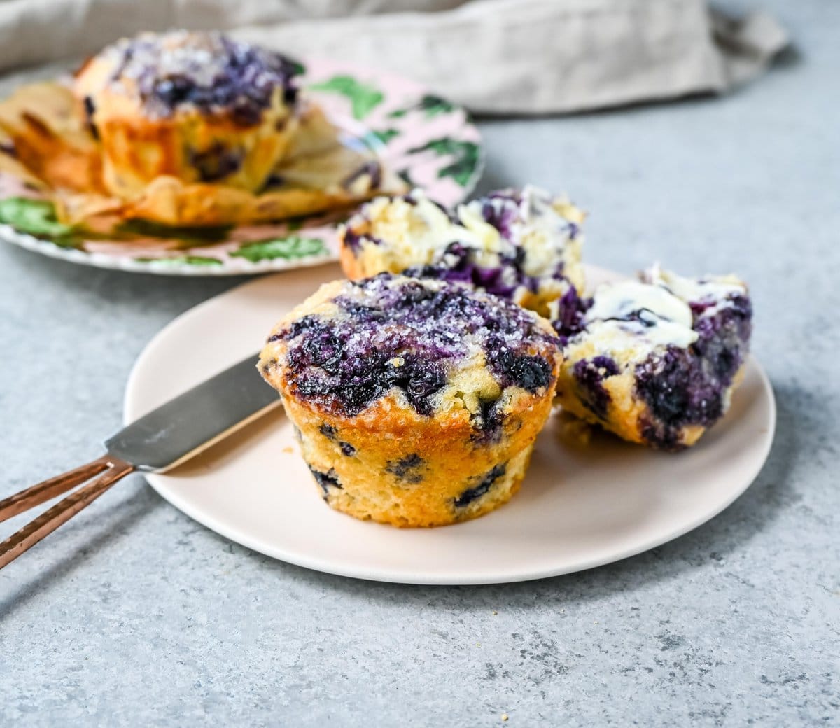 Bursting with juicy blueberries and surrounded by a tender, fluffy crumb, these muffins are a breakfast staple that everyone loves. This blueberry muffin recipe uses both butter and oil plus buttermilk to make the most tender, moistest blueberry muffins!