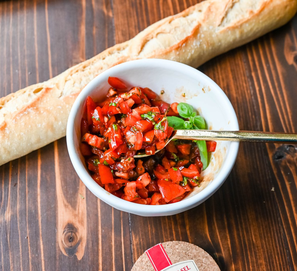 This quick and easy appetizer is made with garlic and herb Boursin cheese and topped with a fresh caprese salad made with tomatoes, olive oil, balsamic glaze, basil, and garlic. This Caprese Dip with boursin cheese pairs perfectly with crostinis or crackers.