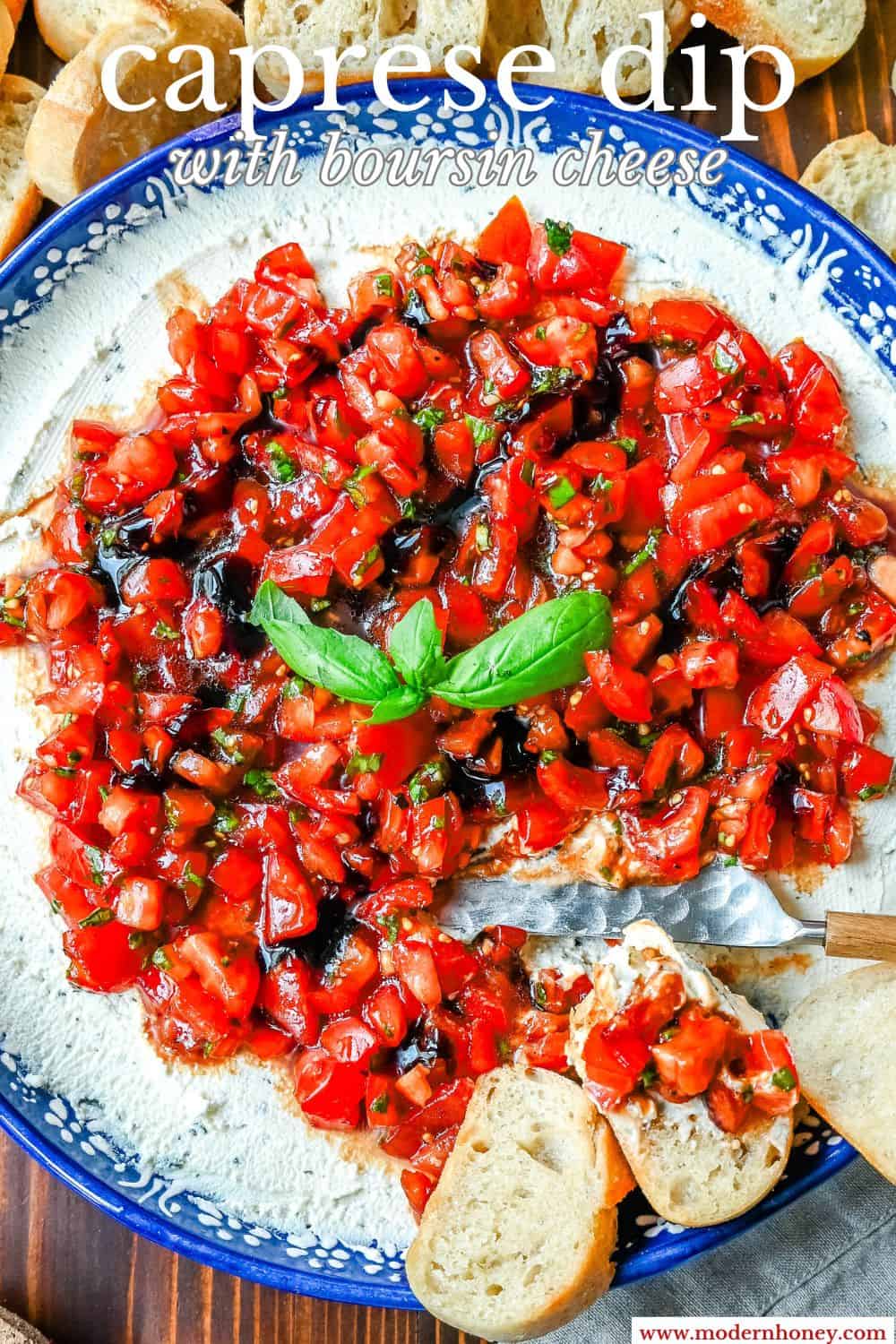 This quick and easy appetizer is made with garlic and herb Boursin cheese and topped with a fresh caprese salad made with tomatoes, olive oil, balsamic glaze, basil, and garlic. This Caprese Dip with boursin cheese pairs perfectly with crostinis or crackers.