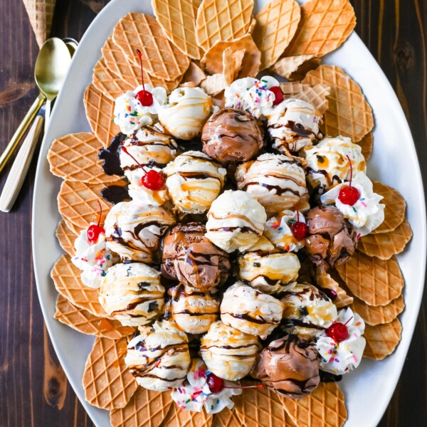 Ice cream nachos are a yummy dessert that combines the crunch of waffle cone pieces with scoops of your favorite ice cream, topped with a variety of delicious toppings like chocolate fudge, caramel, whipped cream, and cherries. This fun and creative ice cream treat is perfect for sharing!