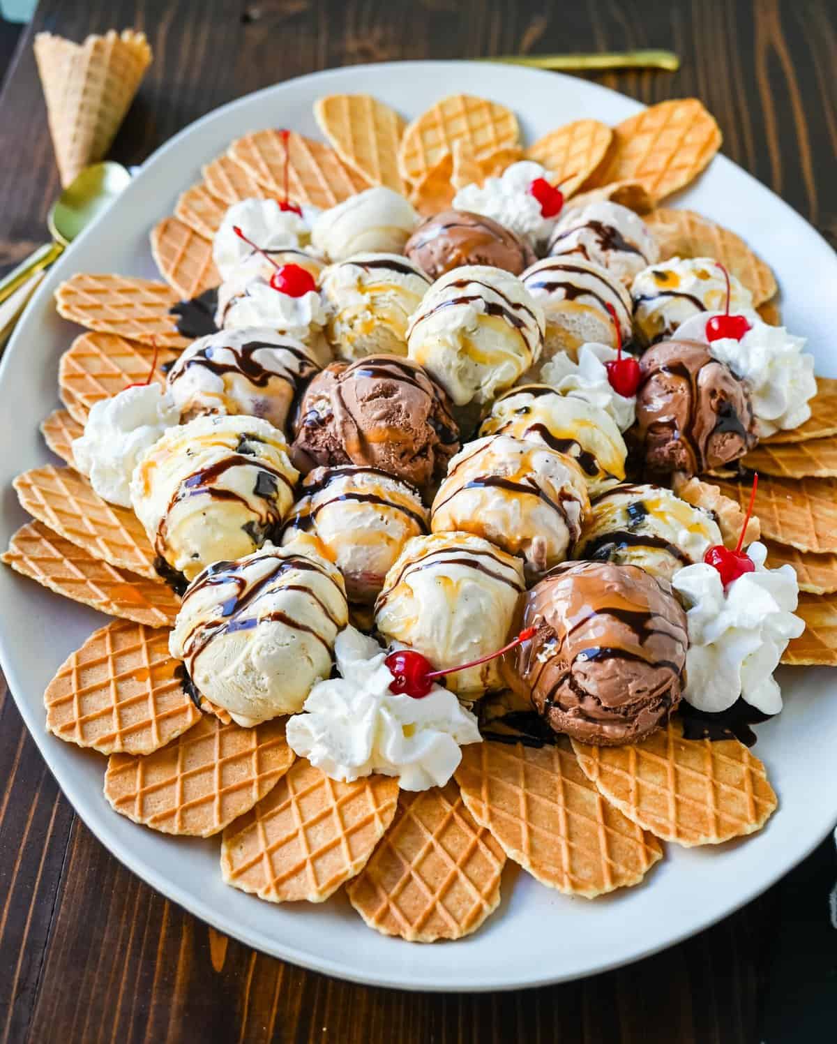 Ice cream nachos are a yummy dessert that combines the crunch of waffle cone pieces with scoops of your favorite ice cream, topped with a variety of delicious toppings like chocolate fudge, caramel, whipped cream, and cherries. This fun and creative ice cream treat is perfect for sharing! 