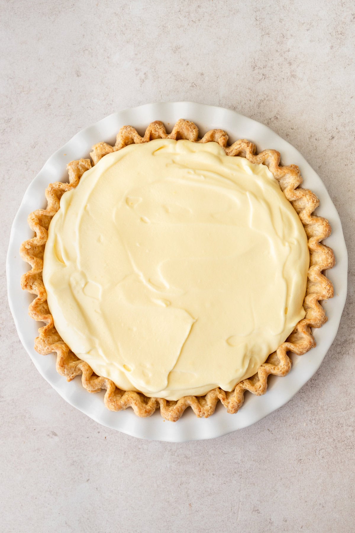 Layer of banana cream pie filling made with vanilla pudding and fresh whipped cream.