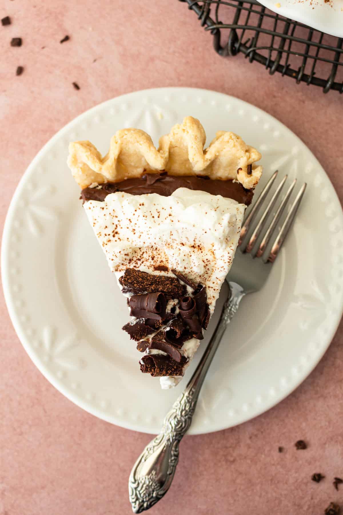 This is the best Chocolate Cream Pie recipe made with decadent chocolate custard in a flaky, buttery crust and topped with homemade whipped cream and chocolate shavings. You will love this chocolate pie recipe!