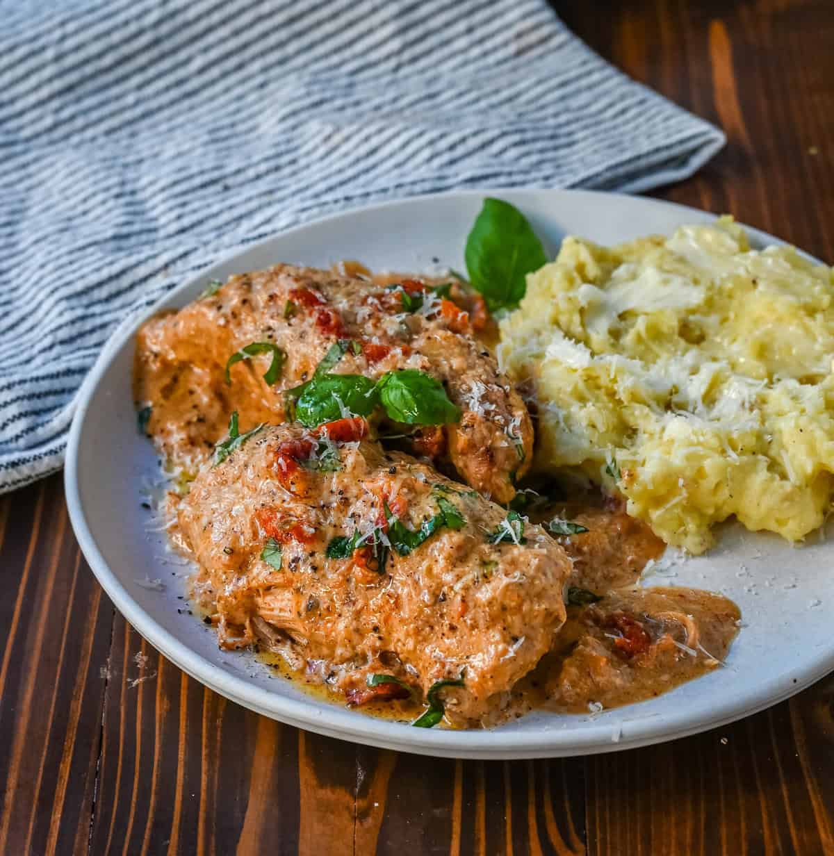 Crockpot Marry Me Chicken is a deliciously rich and creamy dish that is bursting with flavor. This slow cooker Marry Me Chicken is made with tender chicken simmers in a sauce made with garlic, sun-dried tomatoes, and Parmesan, creating a savory blend of tangy, herby, and cheesy goodness. The creamy sauce, with hints of sweetness from the sun-dried tomatoes and a touch of spice, coats every bite, making it irresistible.