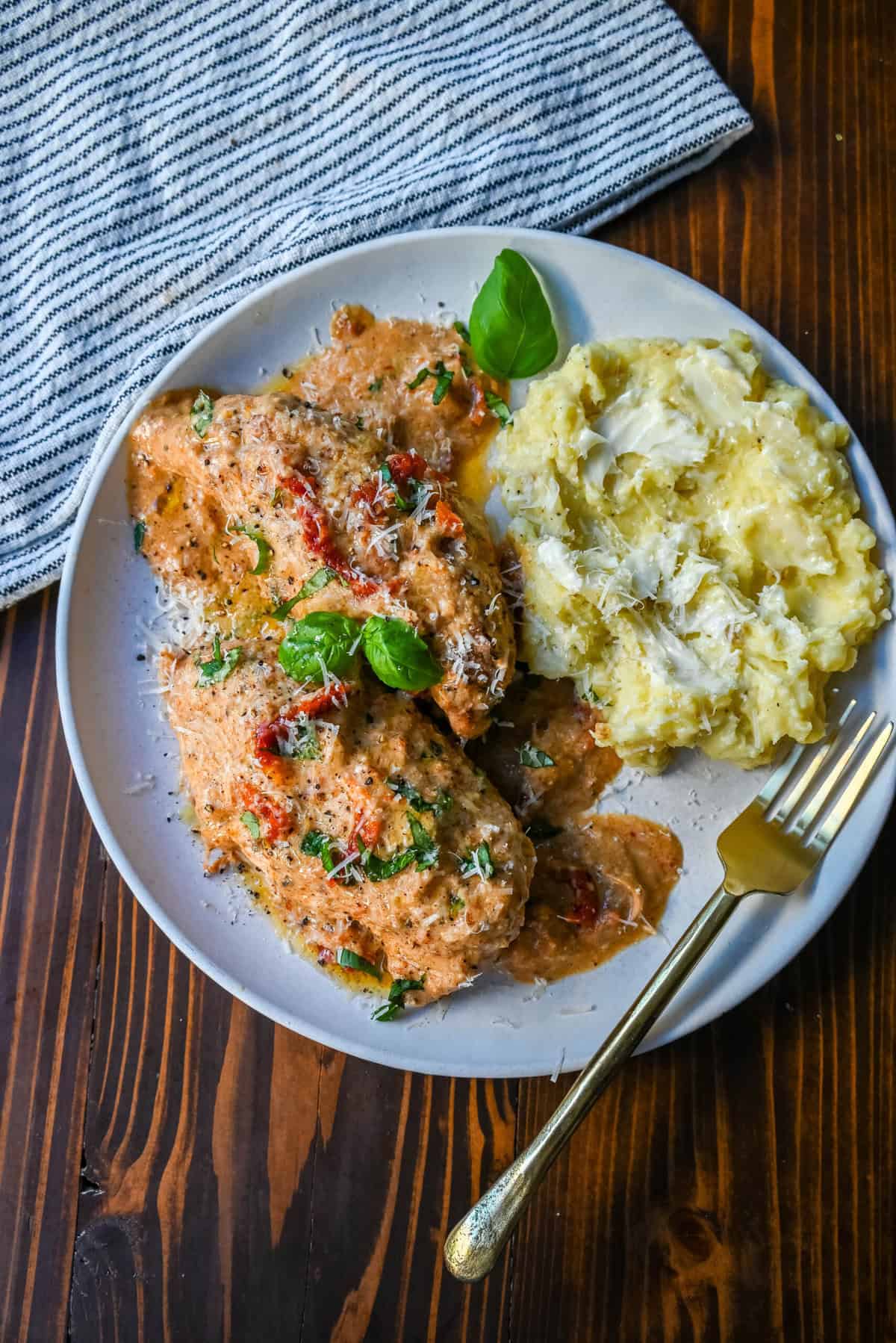 Crockpot Marry Me Chicken is a deliciously rich and creamy dish that is bursting with flavor. This slow cooker Marry Me Chicken is made with tender chicken simmers in a sauce made with garlic, sun-dried tomatoes, and Parmesan, creating a savory blend of tangy, herby, and cheesy goodness. The creamy sauce, with hints of sweetness from the sun-dried tomatoes and a touch of spice, coats every bite, making it irresistible.