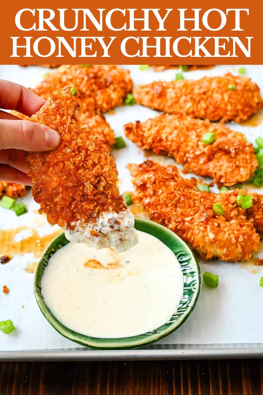 Tender, juicy chicken coated in a crispy cornflake crust that is baked to golden perfection, and then drizzled with sweet and spicy hot honey. These Crispy Crunchy Hot Honey Chicken Tenders deliver the perfect balance of crunch and heat, with a mouthwatering sticky glaze that keeps you coming back for more.