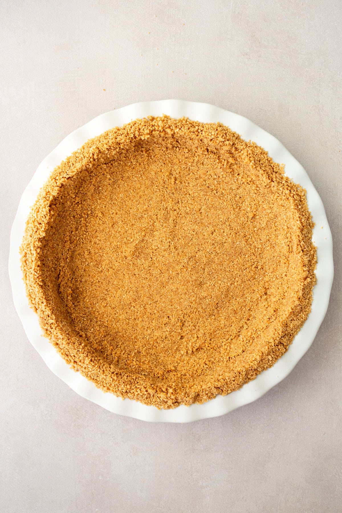 Making a homemade graham cracker crust for key lime pie