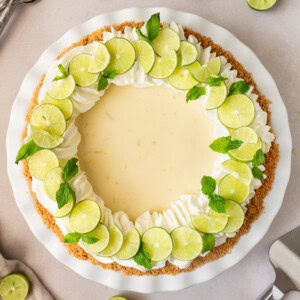 Learn how to make the best key lime pie with a perfectly sweet and buttery graham cracker crust. This easy key lime pie recipe features fresh key lime juice for a tangy, refreshing filling, balanced with the sweetness of condensed milk. Ideal for summer gatherings or as a classic dessert, follow our step-by-step guide to create this homemade key lime pie that everyone will love!