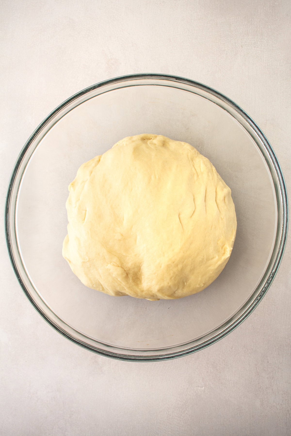 Knotted roll dough rising