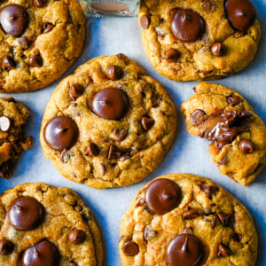 These Brown Butter Pumpkin Chocolate Chip Cookies are made with browned butter, brown sugar, pure pumpkin puree, pumpkin spice, and semisweet chocolate chips. These are the perfect chewy pumpkin chocolate chip cookie recipe!