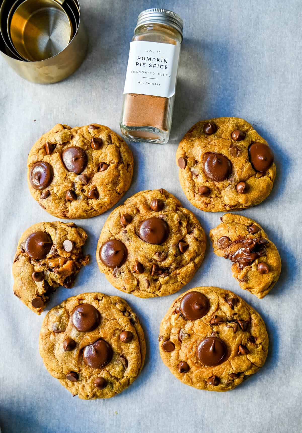 These Brown Butter Pumpkin Chocolate Chip Cookies are made with browned butter, brown sugar, pure pumpkin puree, pumpkin spice, and semisweet chocolate chips. These are the perfect chewy pumpkin chocolate chip cookie recipe!