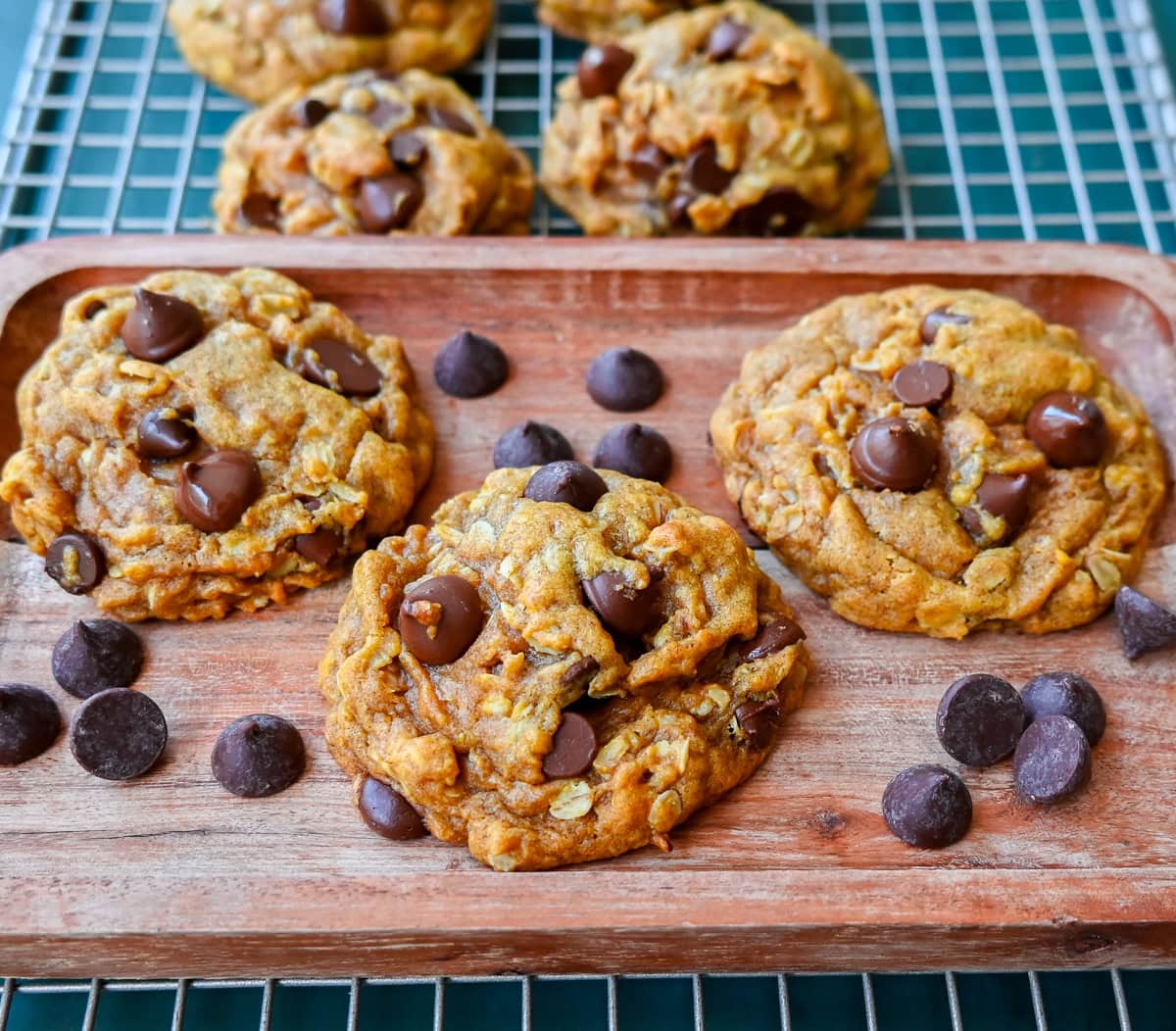 These pumpkin oatmeal chocolate chip cookies are made with browned butter, spiced pumpkin, oatmeal, and rich semi-sweet chocolate chips. This chocolate chip pumpkin oatmeal cookie is the perfect Fall cookie. How to make the perfect chewy, melt-in-your-mouth saucepan pumpkin chocolate chip cookie.