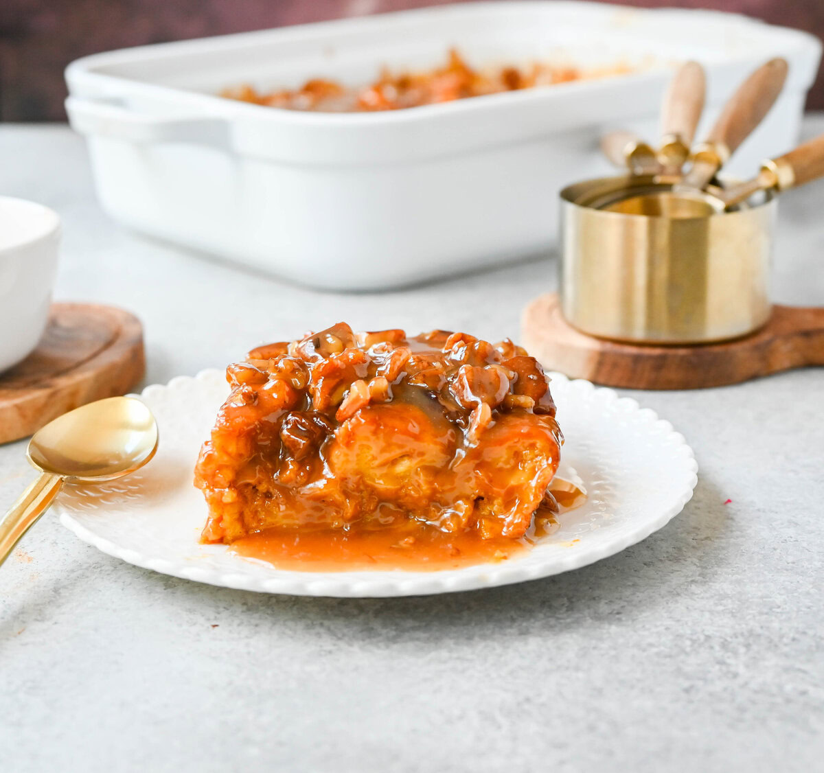 This Pumpkin Praline Bread Pudding is made with brioche bread, homemade pumpkin spice custard and baked until perfectly golden and then topped with a caramel butter pecan sauce. This Pumpkin Bread Pudding with Caramel Pecan Sauce is the perfect Fall comfort food dessert.