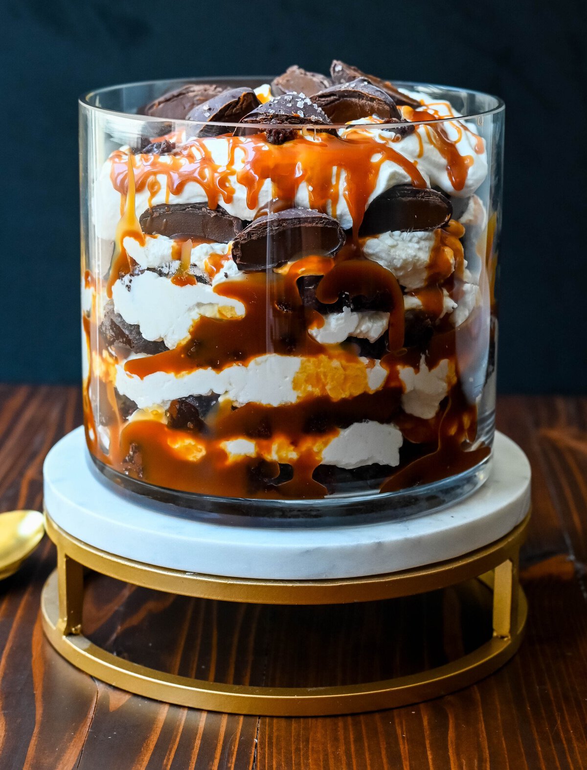 This Salted Caramel Brownie Cheesecake Trifle is made layers of rich, fudgy brownies, creamy cheesecake filling, salted caramel, homemade whipped cream, and chocolate covered caramels. This is the perfect sweet dessert to impress your guests and is such a crowd pleaser!