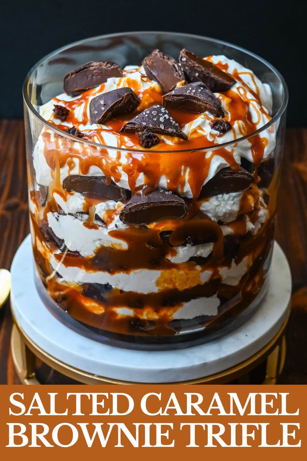 This Salted Caramel Brownie Cheesecake Trifle is made layers of rich, fudgy brownies, creamy cheesecake filling, salted caramel, homemade whipped cream, and chocolate covered caramels. This is the perfect sweet dessert to impress your guests and is such a crowd pleaser!