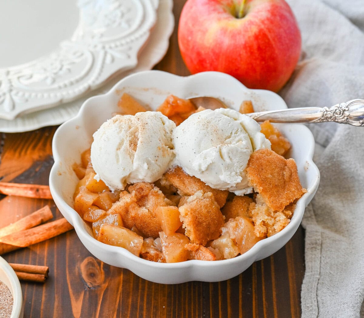 This Apple Cobbler recipe is made with fresh apples sauteed with butter, cinnamon, brown sugar, and apple cider and then baked with the most perfect topping that is sweet, crisp, and pairs perfectly with the fresh apples. This is the best apple cobbler recipe!