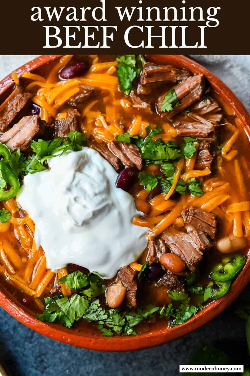 This bold and flavorful beef chili recipe combines tender, bite-sized cubes of chuck roast with a blend of beans, spices, and a can of Dr. Pepper (or Coke) to help tenderize the meat and add a touch of sweetness. The combination of chili powder, cumin, and cayenne pepper gives the chili a rich, smoky heat, while the fire-roasted tomatoes and beef broth create a hearty base. Perfect for a cozy meal or a game day feast, this chili is easily customizable with your favorite toppings like cheese, sour cream, or fresh jalapeños for an extra kick. The mix of pinto, kidney, and Great Northern beans adds texture and heartiness, making this dish satisfying and comforting.