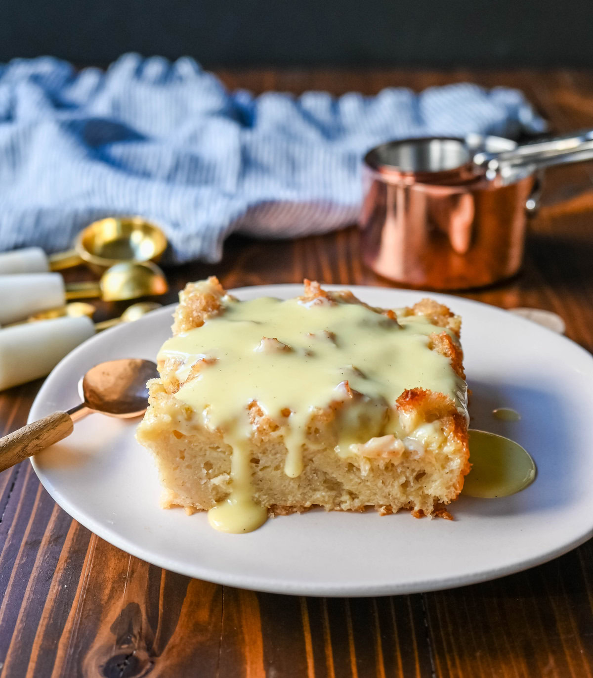 This is the best bread pudding recipe and is the ultimate comfort dessert, with a smooth vanilla bean custard that soaks into rich, day-old bread. Warm spices and vanilla enhance the creamy texture, while a crisp, golden crust forms on top. Finished with a homemade creme anglaise sauce and a dollop of fresh whipped cream. This Bread Pudding with Vanilla Sauce is the perfect comfort food dessert!