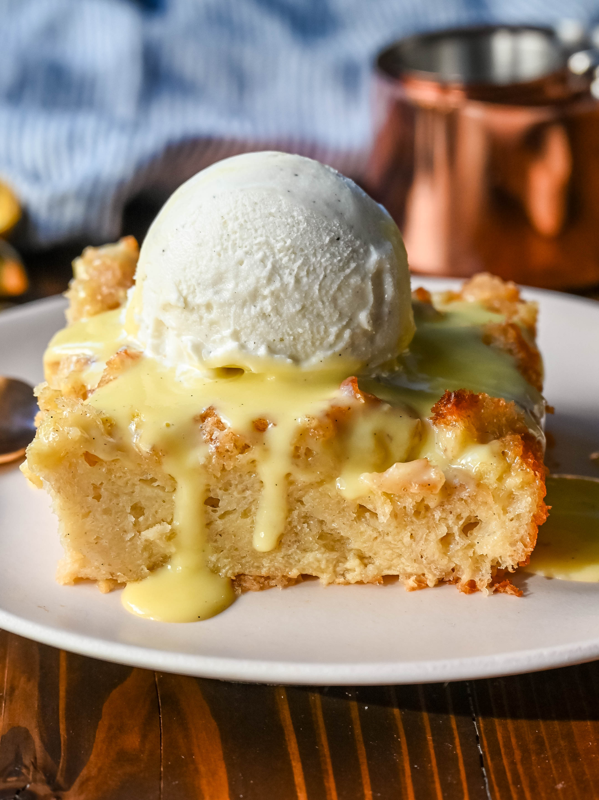 This is the best bread pudding recipe and is the ultimate comfort dessert, with a smooth vanilla bean custard that soaks into rich, day-old bread. Warm spices and vanilla enhance the creamy texture, while a crisp, golden crust forms on top. Finished with a homemade creme anglaise sauce and a dollop of fresh whipped cream. This Bread Pudding with Vanilla Sauce is the perfect comfort food dessert!