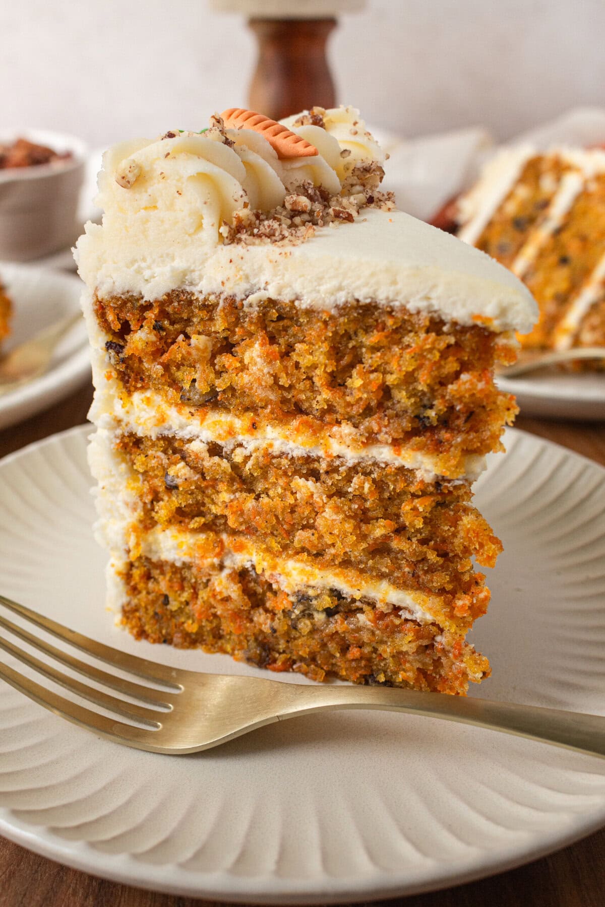 The Best Carrot Cake Recipe. A moist, tender homemade carrot cake covered in a sweet cream cheese frosting. The perfect carrot cake recipe!