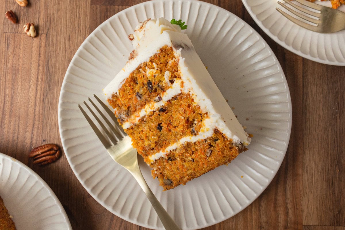 The Best Carrot Cake Recipe. A moist, tender homemade carrot cake covered in a sweet cream cheese frosting. The perfect carrot cake recipe!