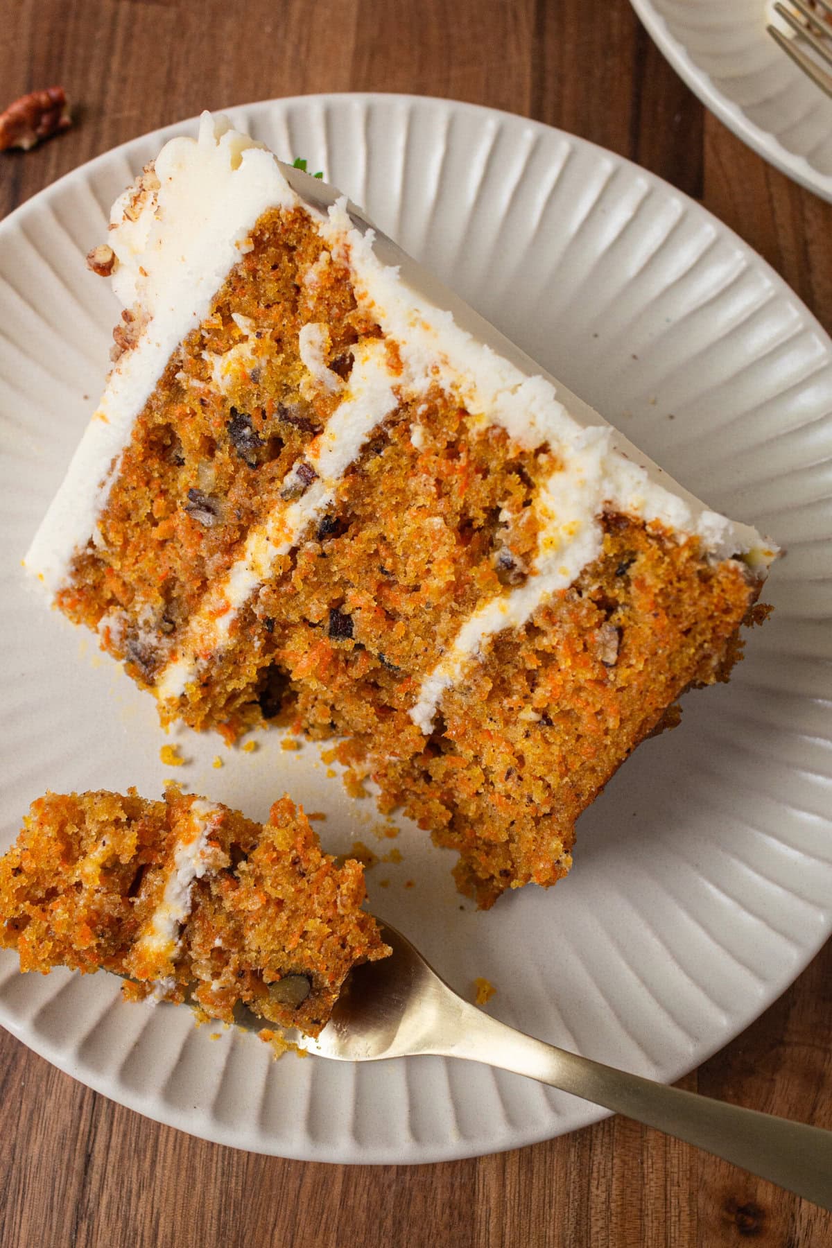 The Best Carrot Cake Recipe. A moist, tender homemade carrot cake covered in a sweet cream cheese frosting. The perfect carrot cake recipe!