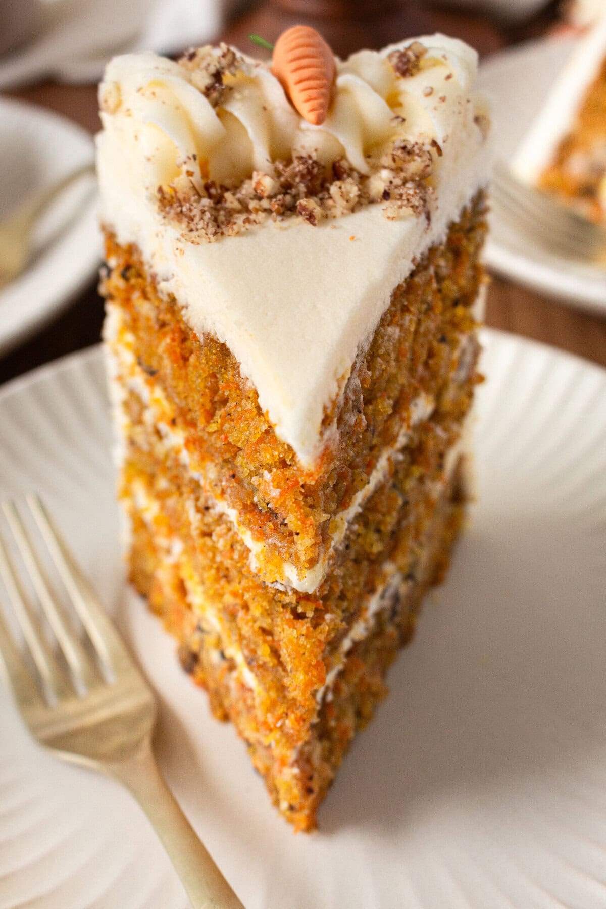 The Best Carrot Cake Recipe. A moist, tender homemade carrot cake covered in a sweet cream cheese frosting. The perfect carrot cake recipe!