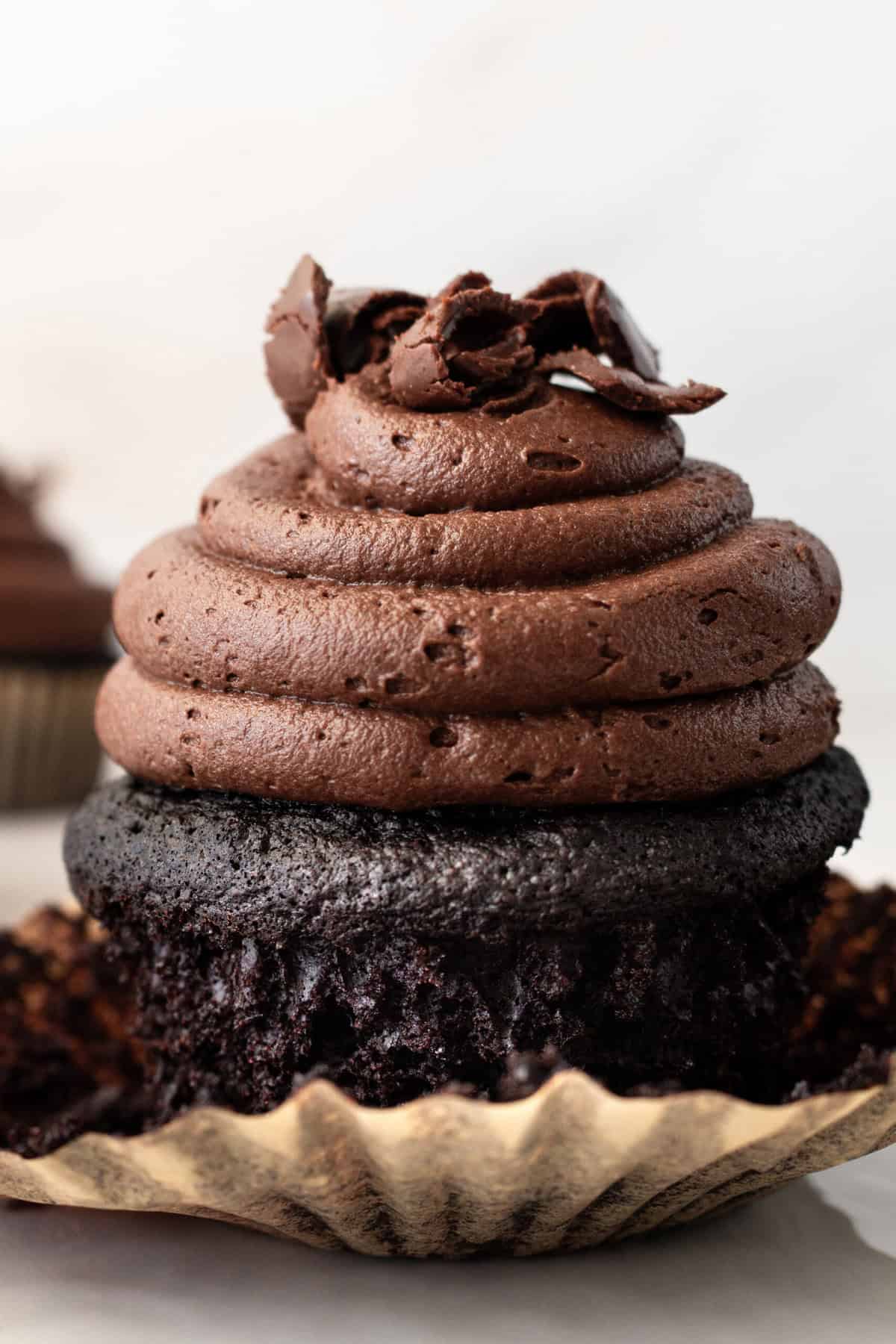 This is the Ultimate Chocolate Cupcake Recipe, with a rich, moist chocolate cake with a tender crumb and a velvet chocolate frosting. These are the best chocolate cupcakes you'll ever taste, with a deep cocoa flavor that melts in your mouth. Not only are they delicious, but this easy chocolate cupcake recipe takes just minutes to prepare. If you are looking for moist chocolate cupcakes that are 5-star rated, this is the recipe for you!