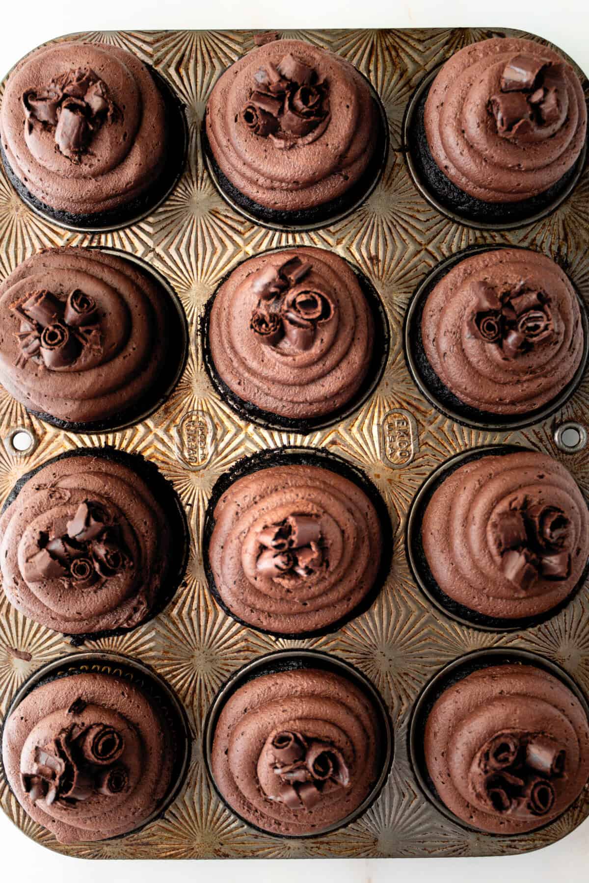 This is the Ultimate Chocolate Cupcake Recipe, with a rich, moist chocolate cake with a tender crumb and a velvet chocolate frosting. These are the best chocolate cupcakes you'll ever taste, with a deep cocoa flavor that melts in your mouth. Not only are they delicious, but this easy chocolate cupcake recipe takes just minutes to prepare. If you are looking for moist chocolate cupcakes that are 5-star rated, this is the recipe for you!