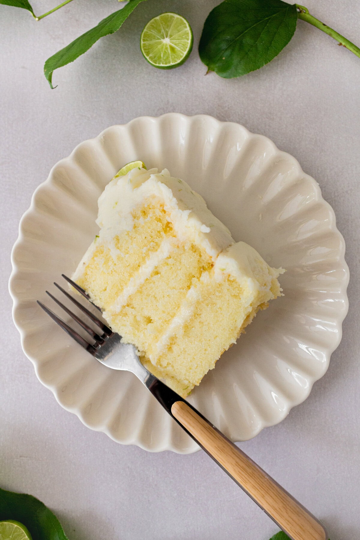 Moist key lime cake with sweet cream cheese frosting. A light and fluffy citrus lime cake with the perfect lime buttercream frosting! This is the best lime cake recipe!