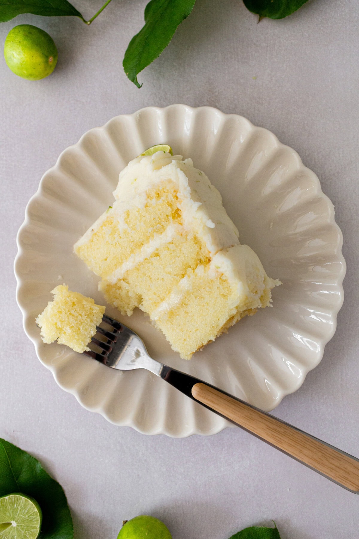 Moist key lime cake with sweet cream cheese frosting. A light and fluffy citrus lime cake with the perfect lime buttercream frosting! This is the best lime cake recipe!