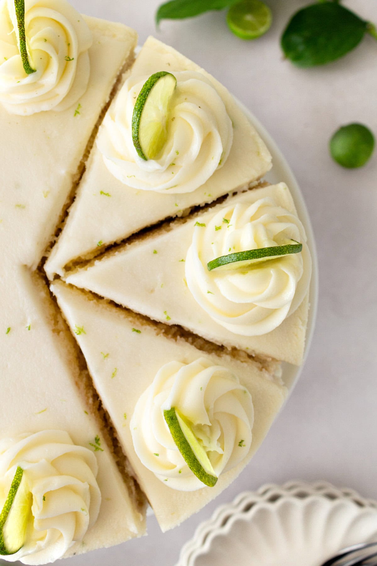 Moist key lime cake with sweet cream cheese frosting. A light and fluffy citrus lime cake with the perfect lime buttercream frosting! This is the best lime cake recipe!